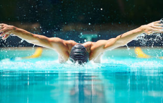 swimmer performing at swim meet