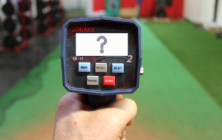 person holding radar gun for baseball pitchers