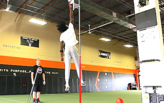 athletic male training his vertical jump